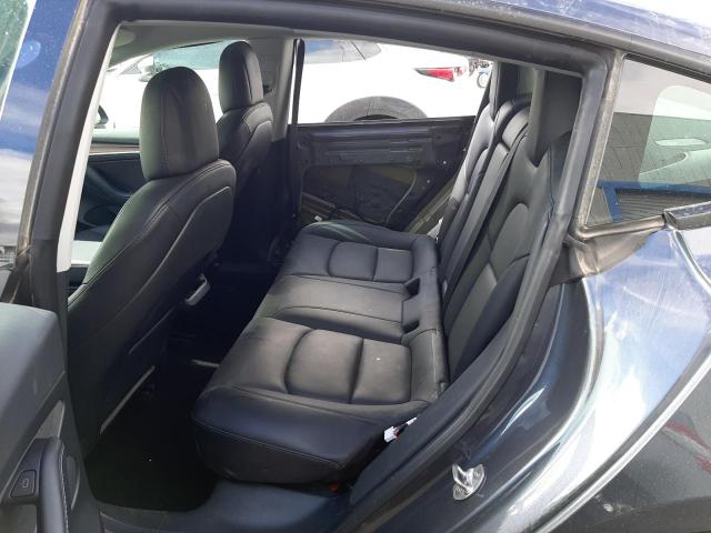 Photo 10 from auction – 2022 TESLA MODEL 3 with VIN 5YJ3E1EC7NF196339