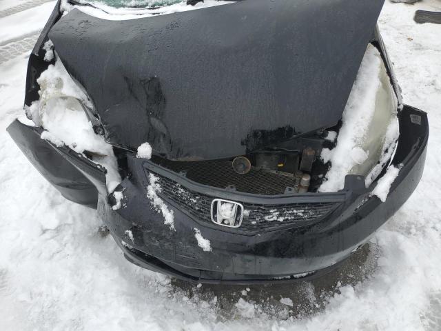 Photo 11 from auction – 2009 HONDA FIT with VIN JHMGE87209S050239