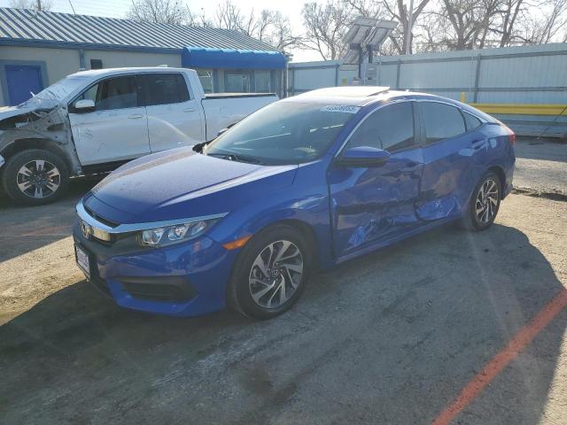HONDA CIVIC EX 2018 with VIN 2HGFC2F74JH585083 - Photo from auction