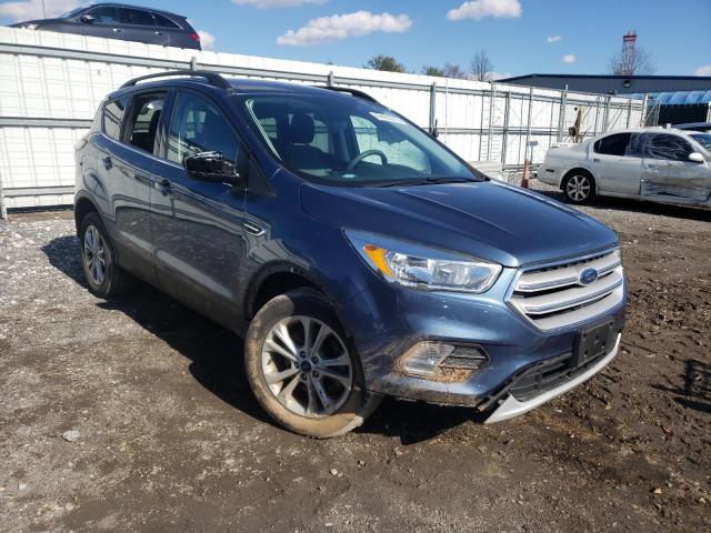 Photo 4 from auction – 2018 FORD ESCAPE SE with VIN 1FMCU9GDXJUB19386