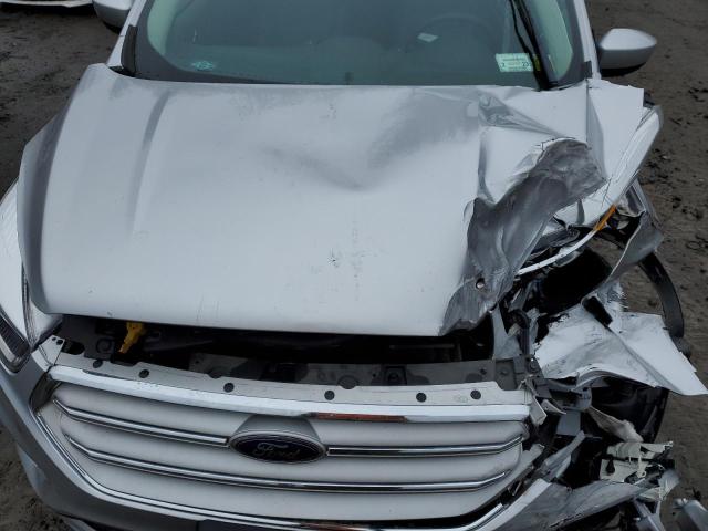 Photo 11 from auction – 2018 FORD ESCAPE SE with VIN 1FMCU9GD9JUB93608