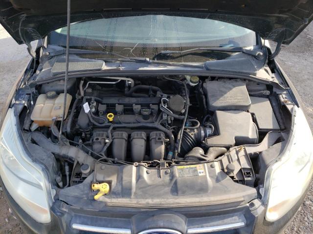 Photo 11 from auction – 2012 FORD FOCUS SE with VIN 1FAHP3F23CL354449
