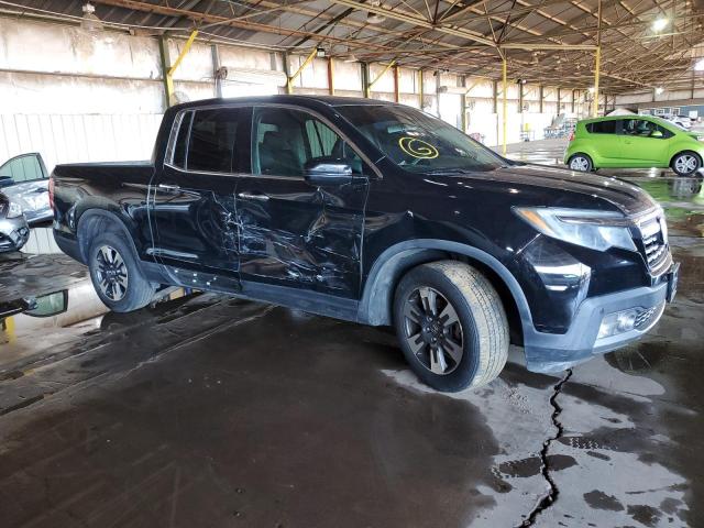 Photo 4 from auction – 2017 HONDA RIDGELINE with VIN 5FPYK3F79HB036681
