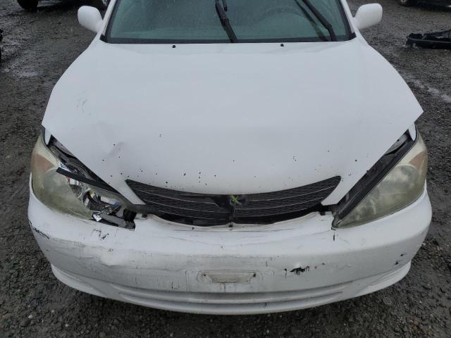 Photo 11 from auction – 2002 TOYOTA CAMRY LE with VIN 4T1BF32K12U034933