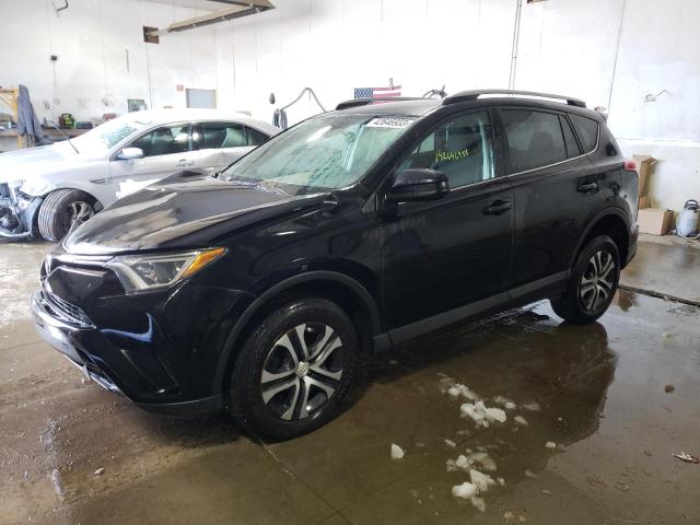 TOYOTA RAV4 LE 2018 with VIN 2T3BFREV3JW774370 - Photo from auction