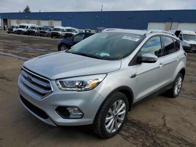 FORD ESCAPE TIT 2017 with VIN 1FMCU9JD0HUD51658 - Photo from auction