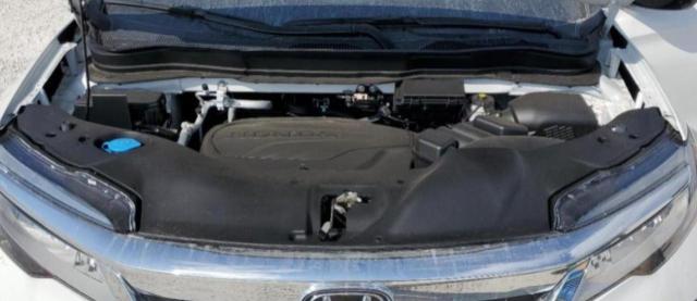 Photo 12 from auction – 2022 HONDA PILOT TOUR with VIN 5FNYF5H65NB020079