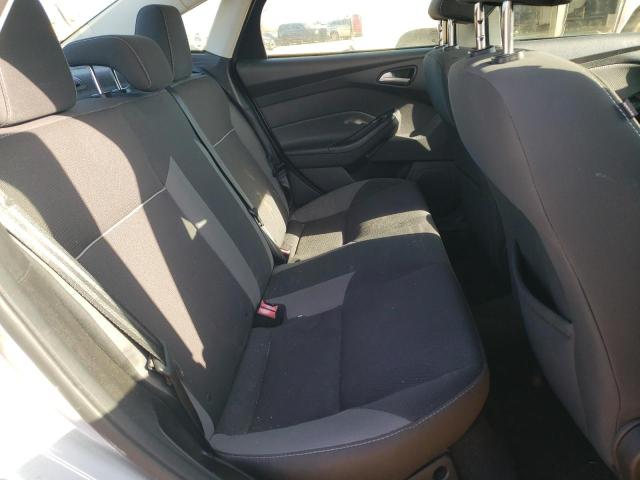 Foto 10 de la subasta – 2014 FORD FOCUS SE con VIN 1FADP3F25EL171457