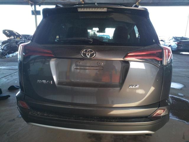 Photo 6 from auction – 2017 TOYOTA RAV4 XLE with VIN JTMWFREV8HD102152