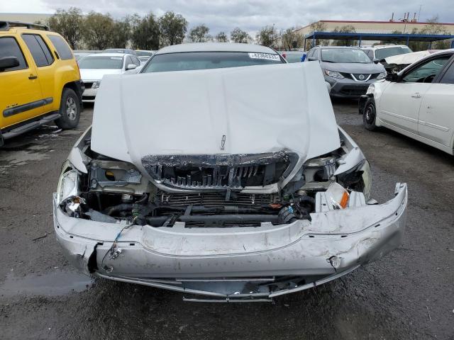 Photo 5 from auction – 2004 LINCOLN TOWN CAR E with VIN 1LNHM81W94Y667838