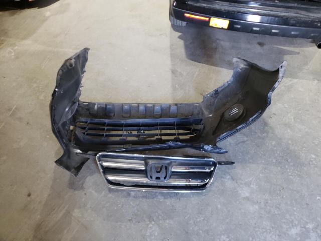 Photo 13 from auction – 2006 HONDA CR-V SE with VIN JHLRD78946C034041