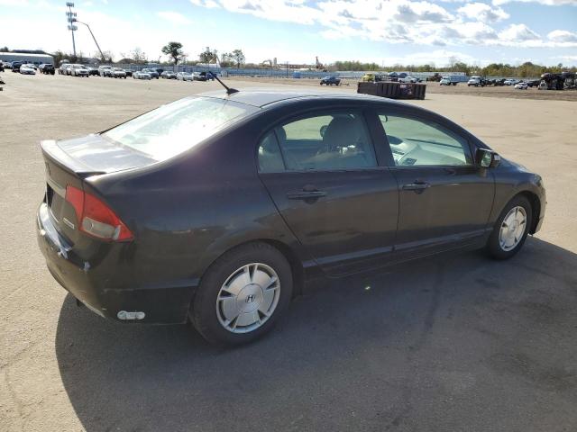 Photo 3 from auction – 2010 HONDA CIVIC HYBR with VIN JHMFA3F28AS004657