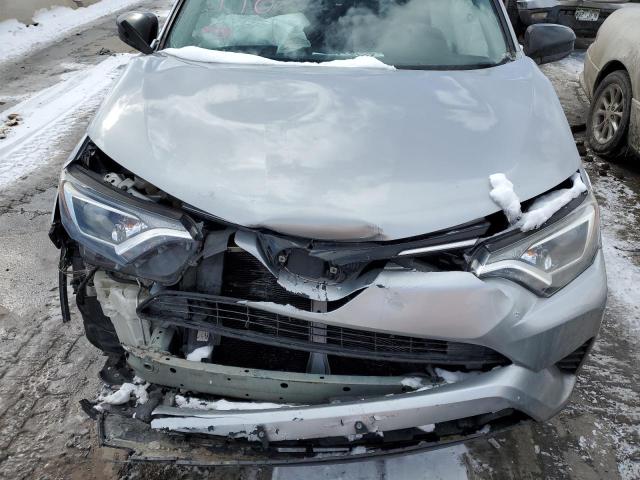 Photo 12 from auction – 2018 TOYOTA RAV4 LE with VIN 2T3BFREV8JW715802