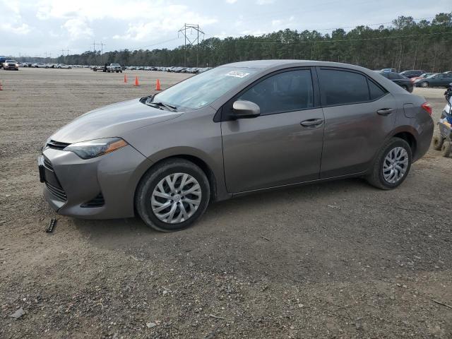 TOYOTA COROLLA L 2017 with VIN 5YFBURHE4HP667768 - Photo from auction