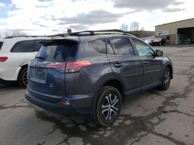 Photo 3 from auction – 2018 TOYOTA RAV4 LE with VIN JTMBFREV8JD223056
