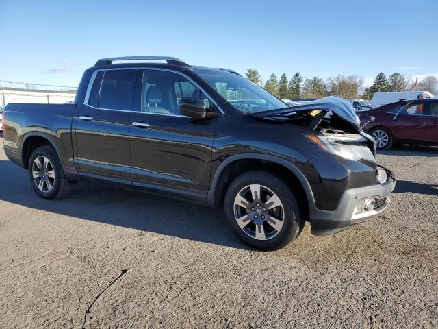 Photo 4 from auction – 2017 HONDA RIDGELINE with VIN 5FPYK3F76HB012810