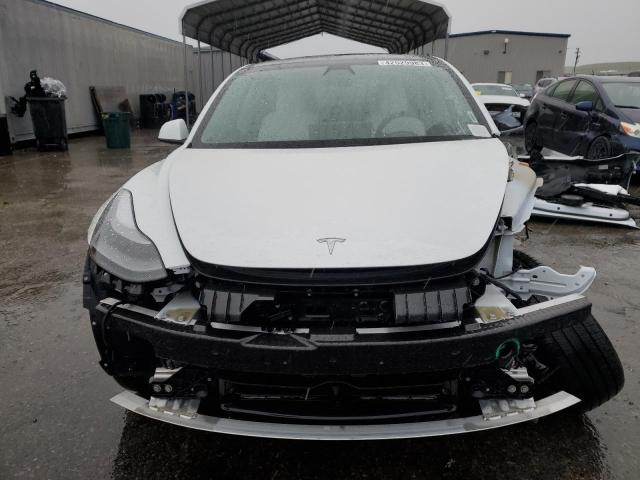 Photo 5 from auction – 2021 TESLA MODEL 3 with VIN 5YJ3E1EA3MF978294