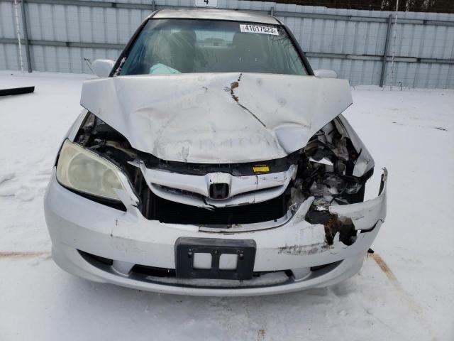 Photo 11 from auction – 2004 HONDA CIVIC LX with VIN 2HGES16664H932448