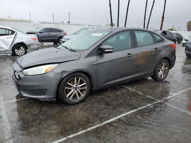 FORD FOCUS SE 2015 with VIN 1FADP3F20FL201529 - Photo from auction