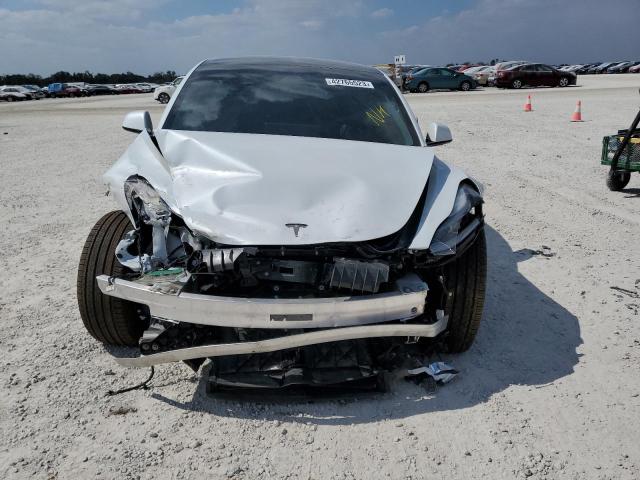 Photo 5 from auction – 2021 TESLA MODEL 3 with VIN 5YJ3E1EA5MF986302