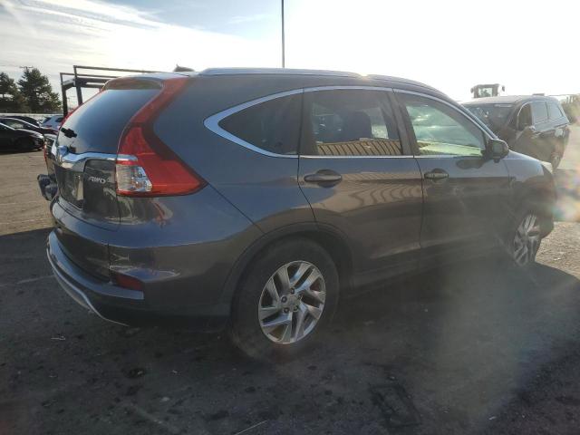 Photo 3 from auction – 2015 HONDA CR-V EXL with VIN 5J6RM4H70FL013479