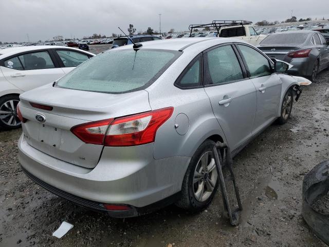 Foto 3 de la subasta – 2014 FORD FOCUS SE con VIN 1FADP3F26EL382635