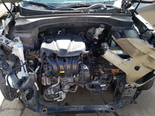 Photo 12 from auction – 2014 KIA SORENTO LX with VIN 5XYKT3A65EG531877