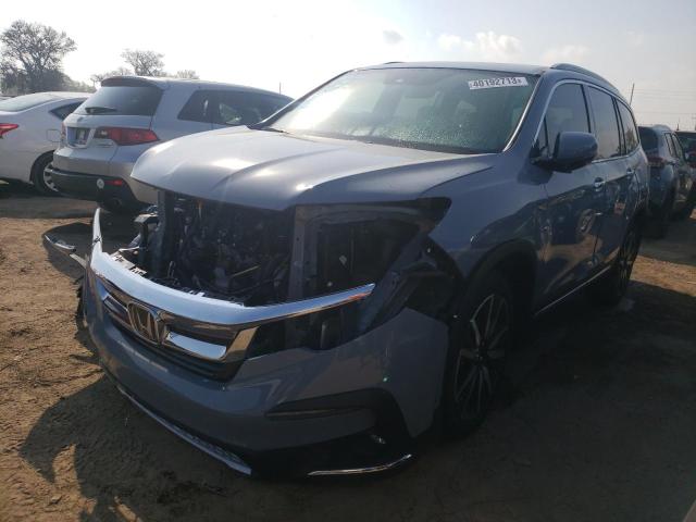 Photo 1 from auction – 2022 HONDA PILOT TOUR with VIN 5FNYF5H66NB021709
