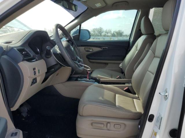 Photo 7 from auction – 2022 HONDA PILOT TOUR with VIN 5FNYF5H65NB020079