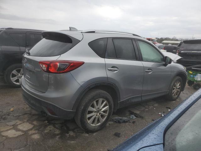 Photo 3 from auction – 2014 MAZDA CX-5 TOURI with VIN JM3KE2CY6E0321580