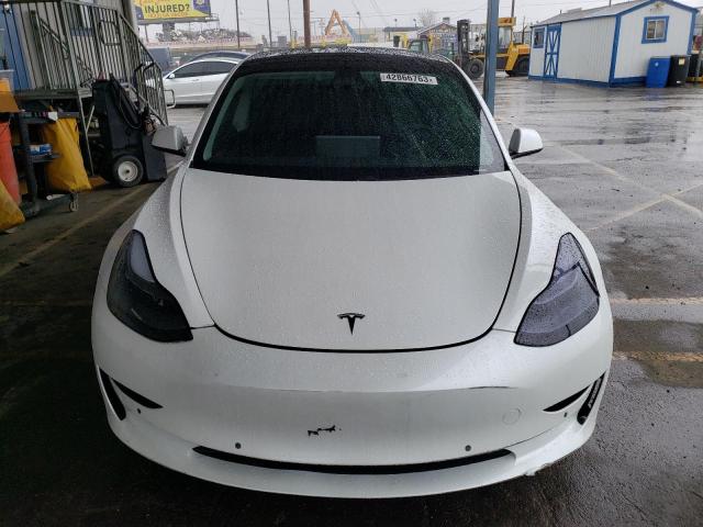 Photo 5 from auction – 2021 TESLA MODEL 3 with VIN 5YJ3E1EC8MF024299