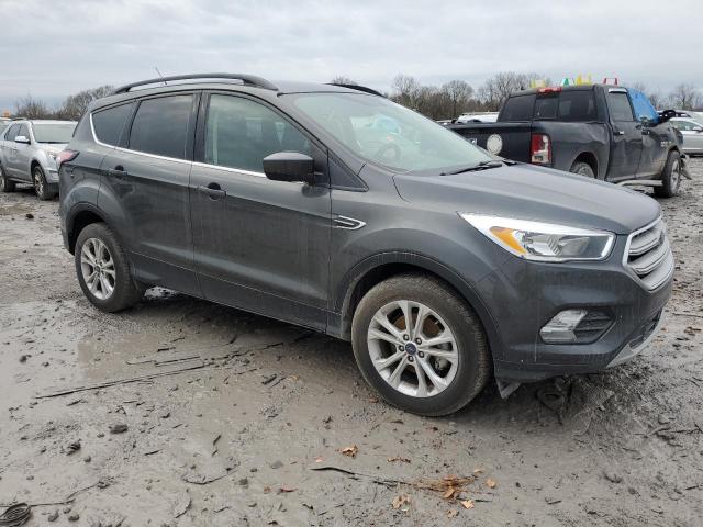 Photo 4 from auction – 2018 FORD ESCAPE SE with VIN 1FMCU0GD4JUC87309
