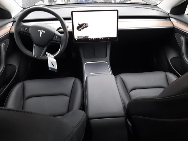 Photo 8 from auction – 2022 TESLA MODEL 3 with VIN 5YJ3E1EAXNF287023