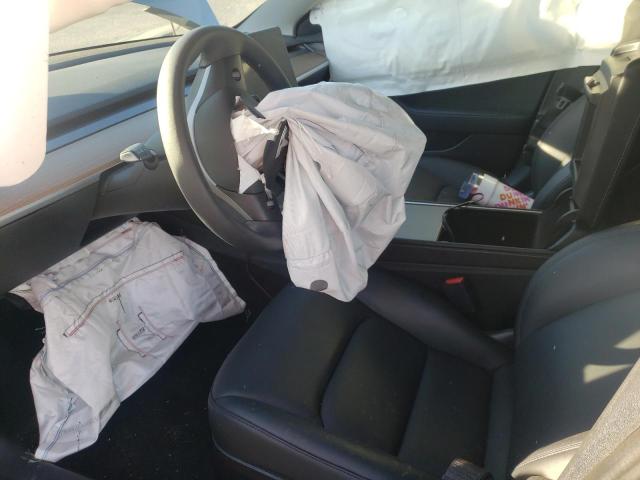 Photo 7 from auction – 2022 TESLA MODEL 3 with VIN 5YJ3E1EB4NF291352