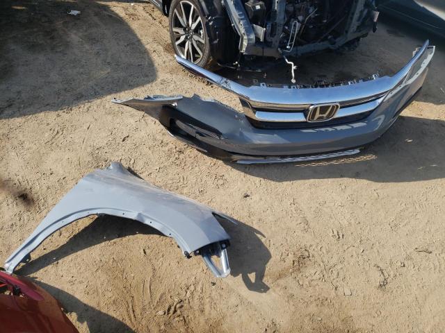 Photo 13 from auction – 2022 HONDA PILOT TOUR with VIN 5FNYF5H66NB021709