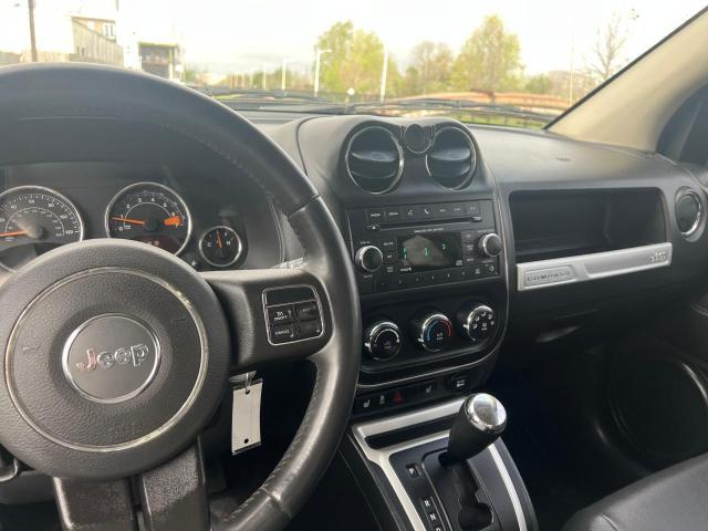 Photo 9 from auction – 2014 JEEP COMPASS LA with VIN 1C4NJDEB7ED811217