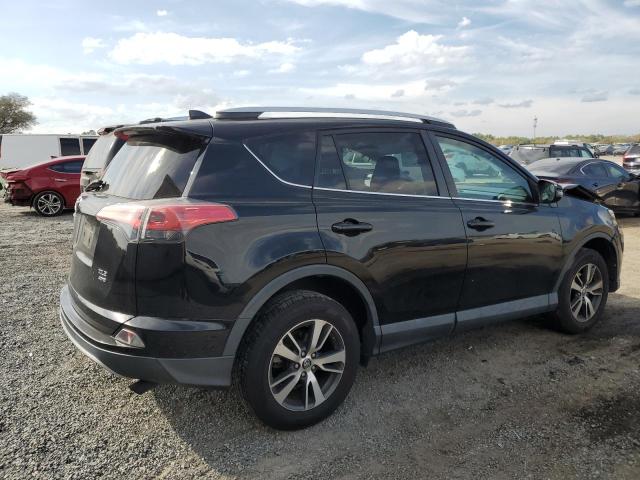 Photo 3 from auction – 2016 TOYOTA RAV4 XLE with VIN 2T3RFREV0GW466628