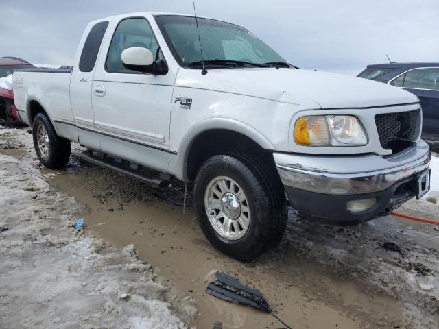 Photo 4 from auction – 2000 FORD F150 with VIN 1FTRX18L6YKB03575