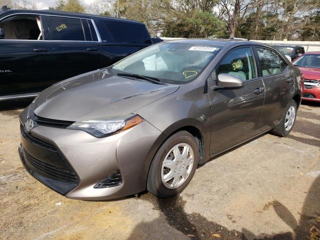 TOYOTA COROLLA LE 2017 with VIN 2T1BPRHE1HC848317 - Photo from auction