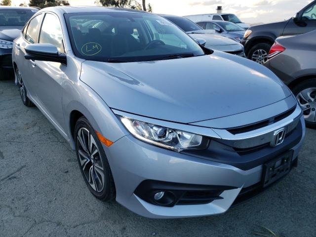 Photo 4 from auction – 2018 HONDA CIVIC EX with VIN 2HGFC1F34JH642602