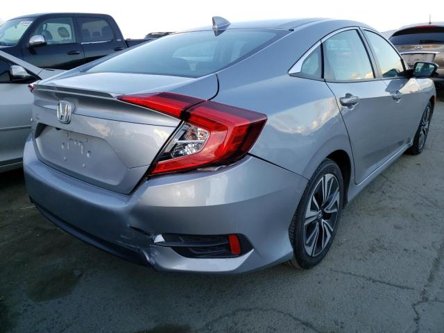 Photo 3 from auction – 2018 HONDA CIVIC EX with VIN 2HGFC1F34JH642602