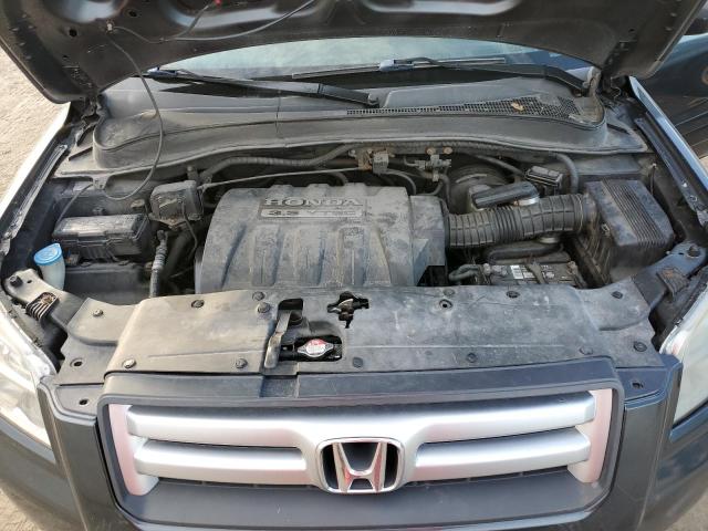 Photo 11 from auction – 2006 HONDA PILOT EX with VIN 2HKYF18616H557964