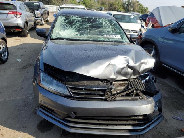 Photo 5 from auction – 2018 VOLKSWAGEN JETTA S with VIN 3VW2B7AJ7JM212876