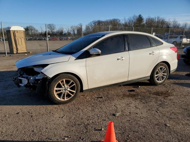 FORD FOCUS SE 2017 with VIN 1FADP3F28HL237665 - Photo from auction