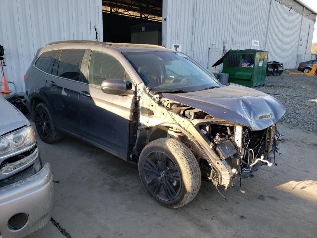Photo 4 from auction – 2022 HONDA PILOT SE with VIN 5FNYF6H25NB064974
