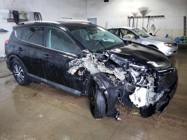 Photo 4 from auction – 2018 TOYOTA RAV4 LE with VIN 2T3BFREV3JW774370