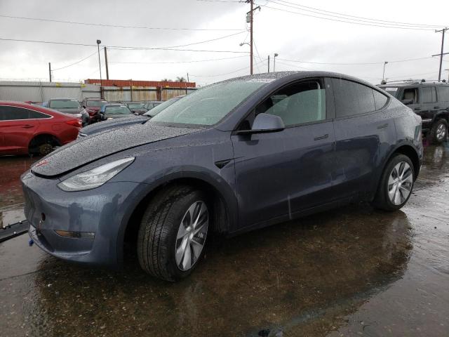 TESLA MODEL Y 2023 with VIN 7SAYGDEE6PA037799 - Photo from auction