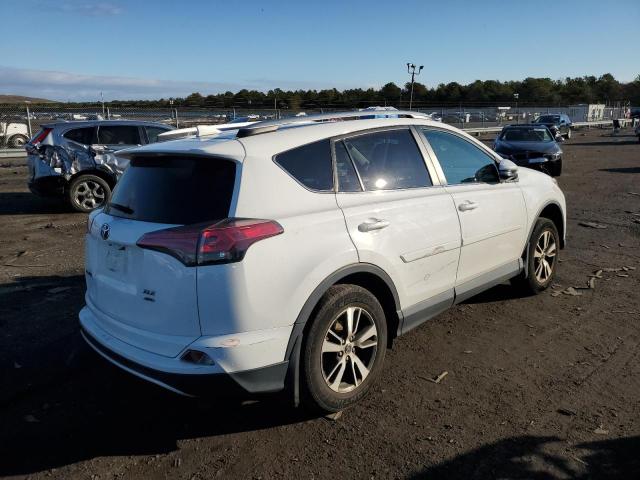 Photo 3 from auction – 2016 TOYOTA RAV4 XLE with VIN 2T3RFREV3GW464193