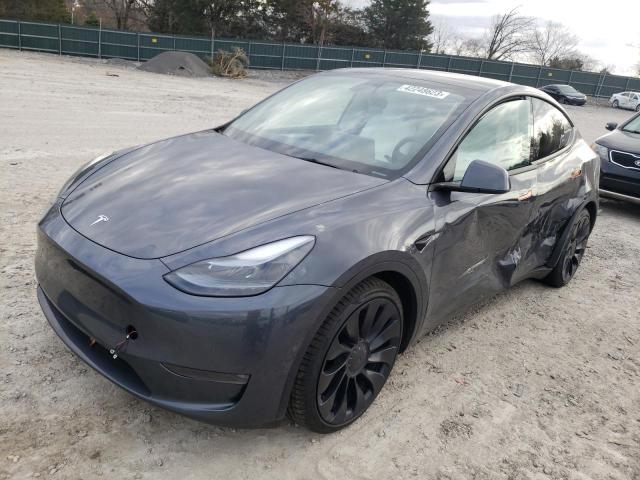 TESLA MODEL Y 2022 with VIN 7SAYGDEF2NF520649 - Photo from auction