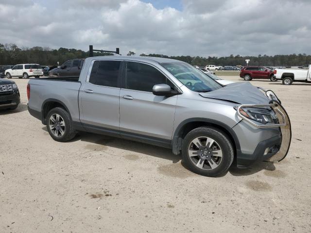 Photo 4 from auction – 2019 HONDA RIDGELINE with VIN 5FPYK3F55KB043200